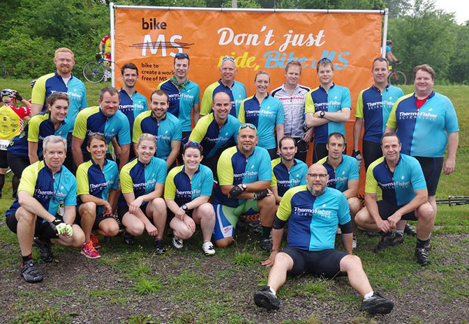 AquaPhoenix employees at a bike event