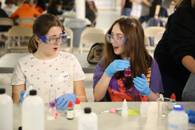 middle school students using an AquaPhoenix test kit