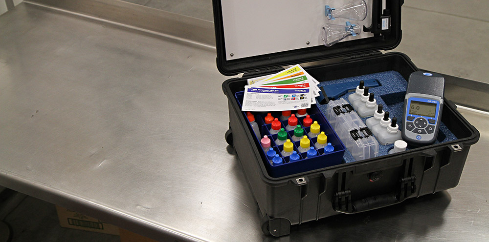 custom test kit from AquaPhoenix on a metal table