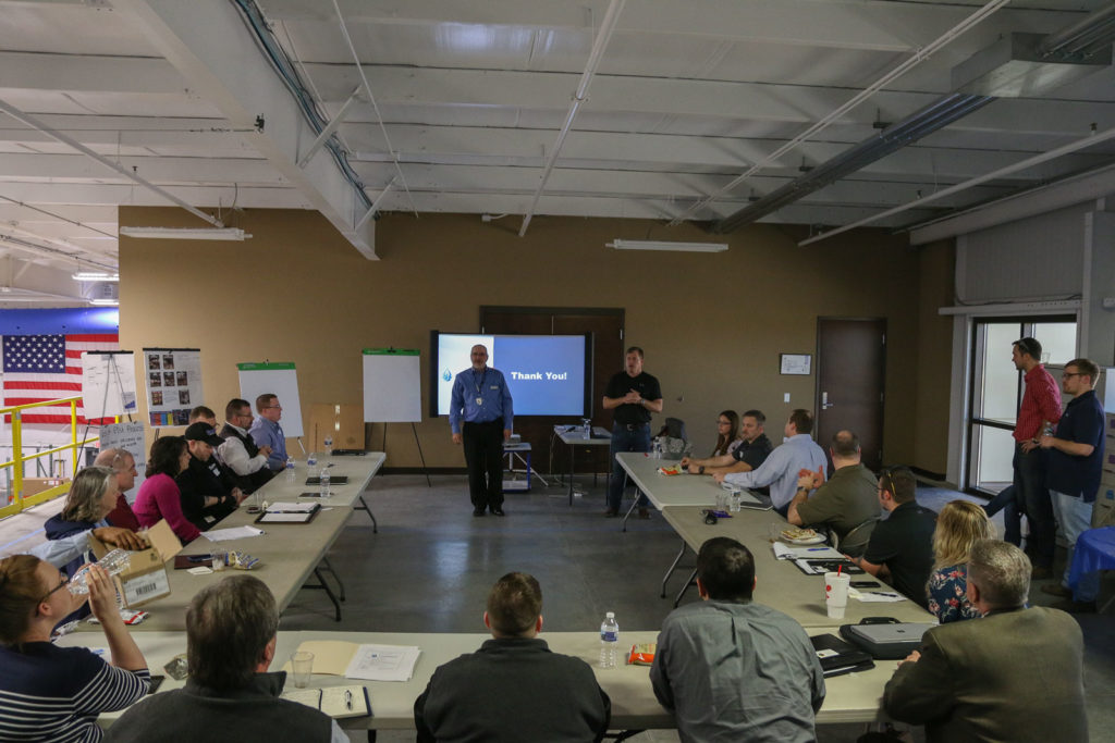 group of people gathering at AquaPhoenix to learn more about lean operation 