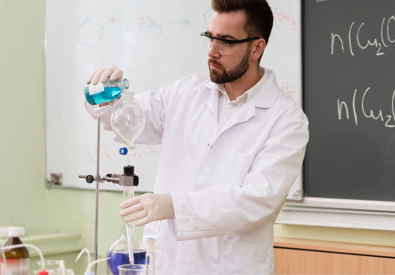 man in a lab coat conducting a science experiment